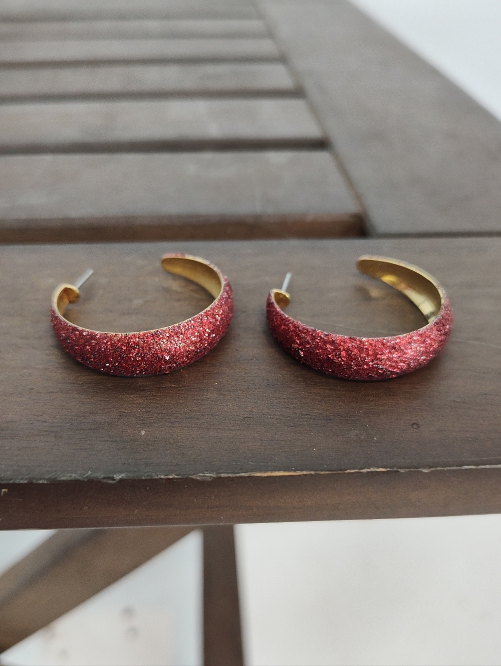 Gold-Accented Hoop Earrings in Red Glitter
